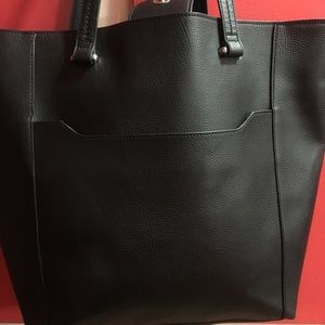 Black Reaction Kenneth Cole purse.
